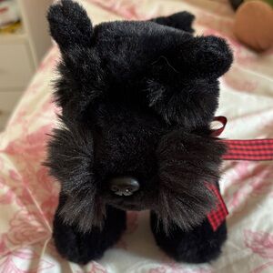 Black Plush Dog Toy with Red Accents
